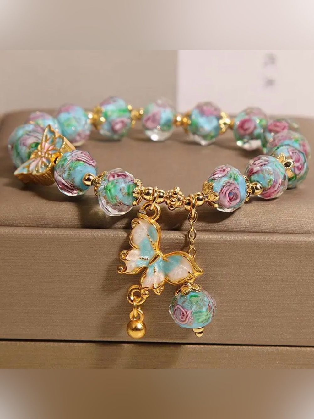 Gold Butterfly Charm Blue Floral Bracelet. - Picture 5 of 8